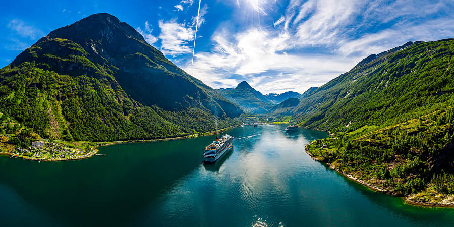Cruising across peaceful Geirangerfjord