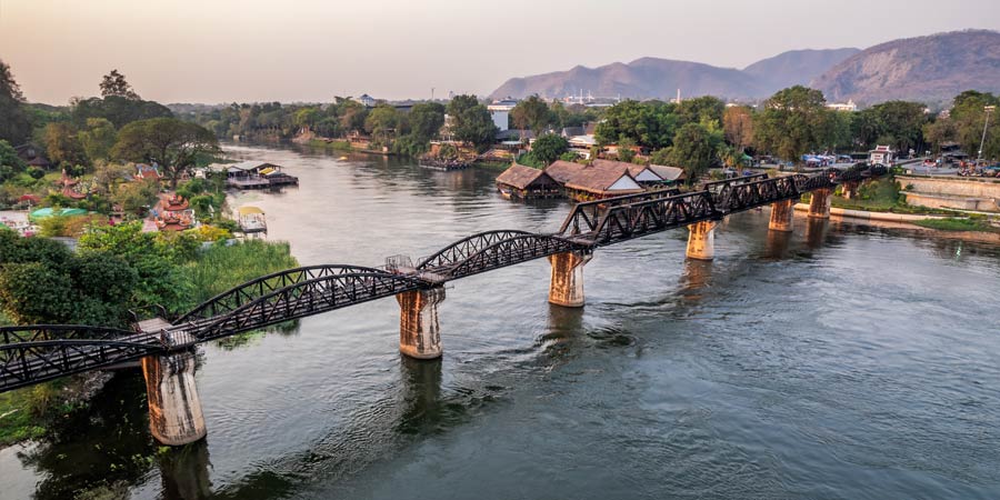 Riding the Burma Railway across the bridge on the River Kwai