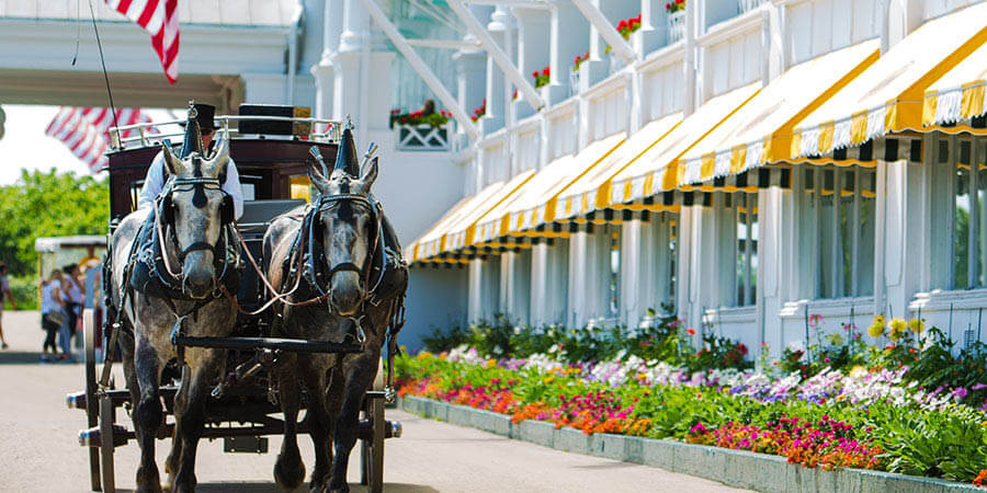Horse Carriage In Front Of Grand Hotel
