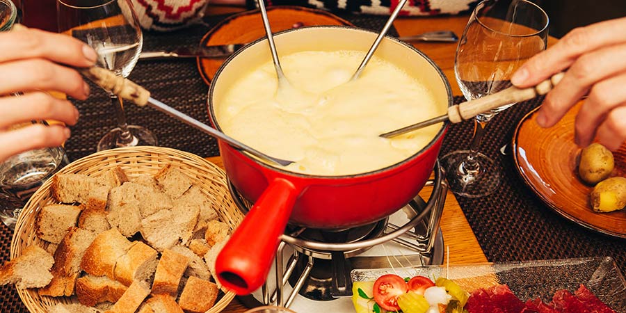Savoring fondue in the medieval town of Gruyères