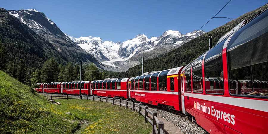 Riding the Bernina Express through alpine scenery