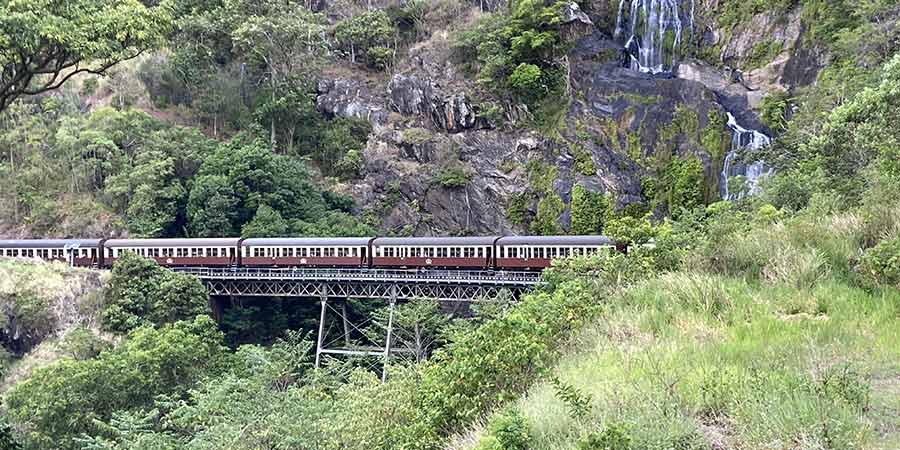The Kuranda Scenic Railroad traveling through the Australian forest.